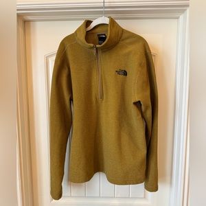 The North Face Men’s half zip pullover size Large.